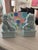 Pair of modern ceramic foo dogs in a lovely soft blue color. These are reproduction and new.