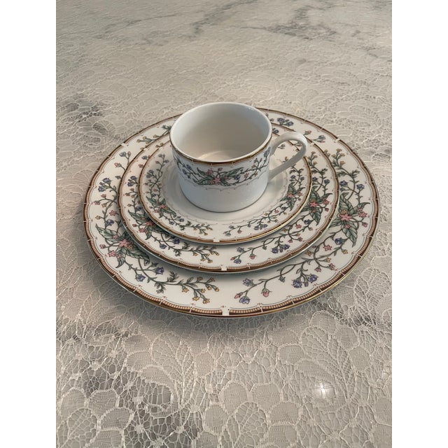 Timeless pattern of vines and flowers. Gold time edge to add elegance to this set. This set is in perfect condition with...