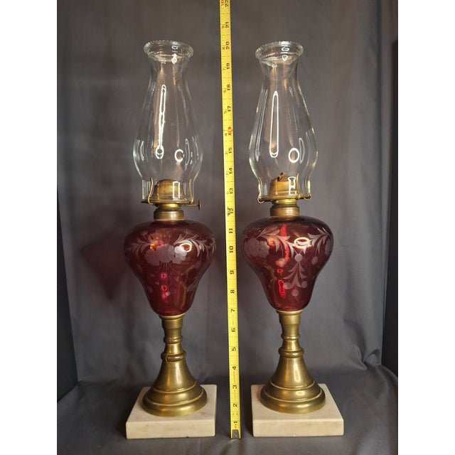 This listing is for a beautiful, authentic matching pair of late 19th-century Victorian/Bohemian kerosene stand lamps. The...