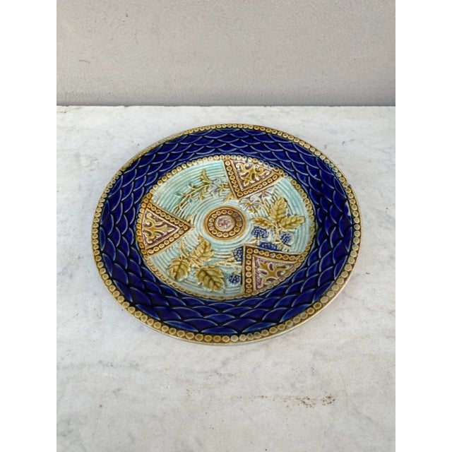 French Majolica plate Onnaing Circa 1890. flowers and blackberries.