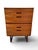 A striking mid-century British tallboy chest of drawers, designed by Gunther Hoffstead for Uniflex circa 1960. Beautifully...