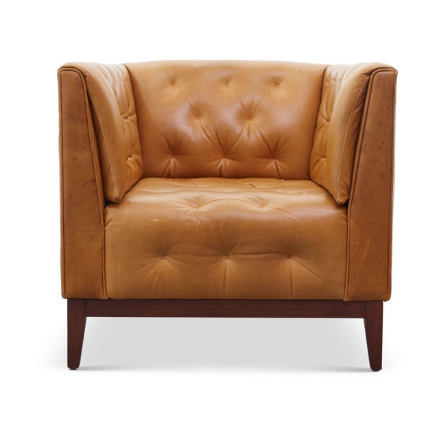 CONTEMPORARY AND TAILORED: This chair channels 1920’s modern style. Accent your interior with sleek, tufted shelter arms...