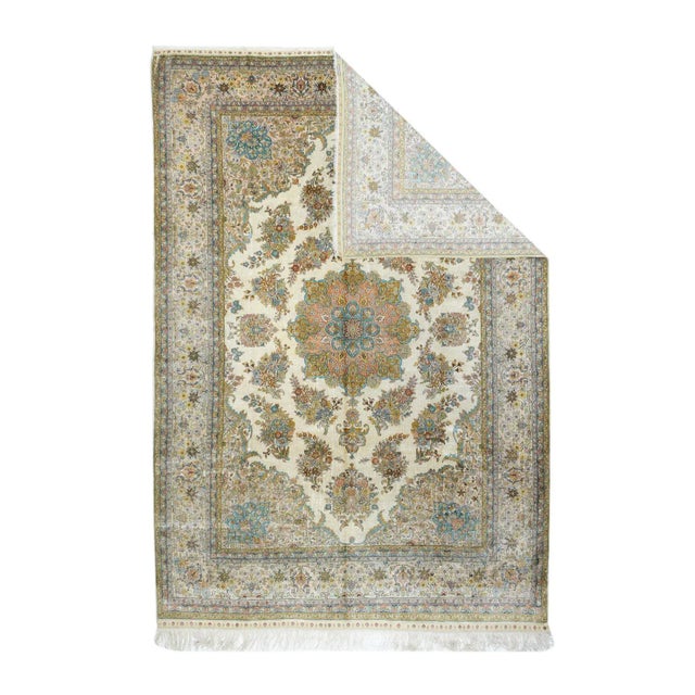 This very finely knotted Turkish city carpet from the Istanbul suburbs is completely Persian in style from the creamy...