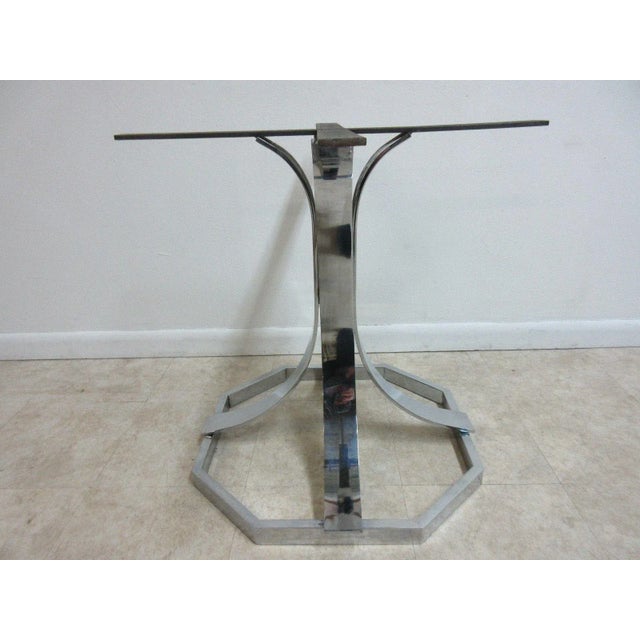 A vintage chrome dining table base. Great shape. Sturdy. Shows some scratches and rub marks... minor surface rust.