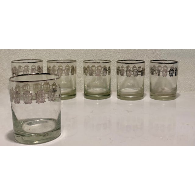 Add a touch of retro Americana charm to your bar cart with this hard to find set of six vintage Mid-Century Modern lowball...