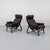 1970s lounge chair with a flowing bentwood frame running in one continuous line from front to back. design reflects...