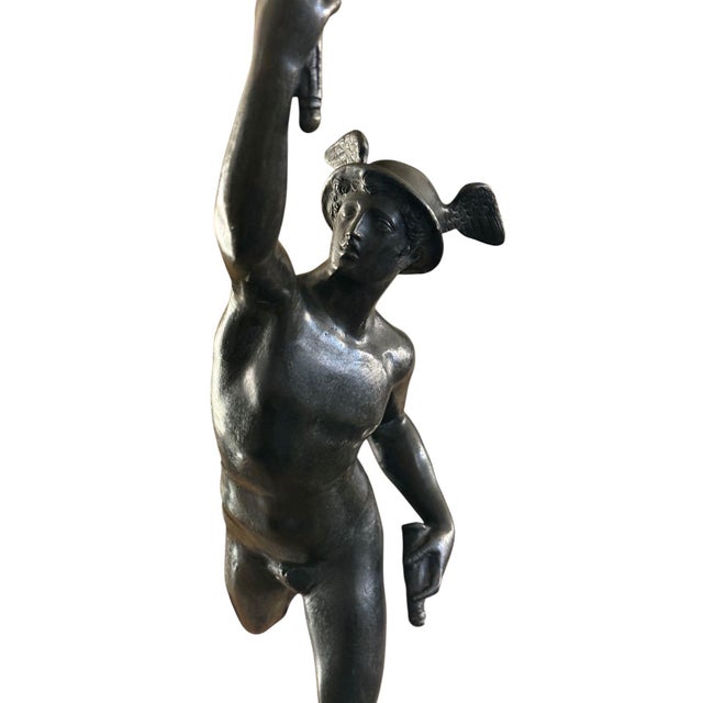An unusual and highly decorative Italian 19th-century patinated and gilt-bronze sculpture of Flying Mercury, after the...