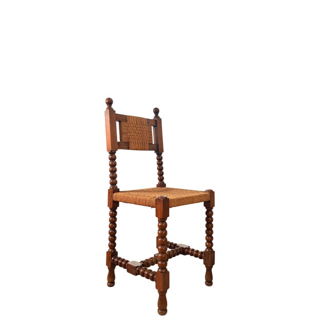 This type of chair, although originating in religious settings (such as monks' or friars' chairs), was adopted in noble...