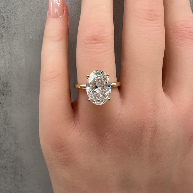 Early 21st Century 4.12ct Oval Lab Grown Diamond Ring Igi F Vs1 14k Yellow Gold Hidden Halo, Size 7 For Sale - Image 5 of 7