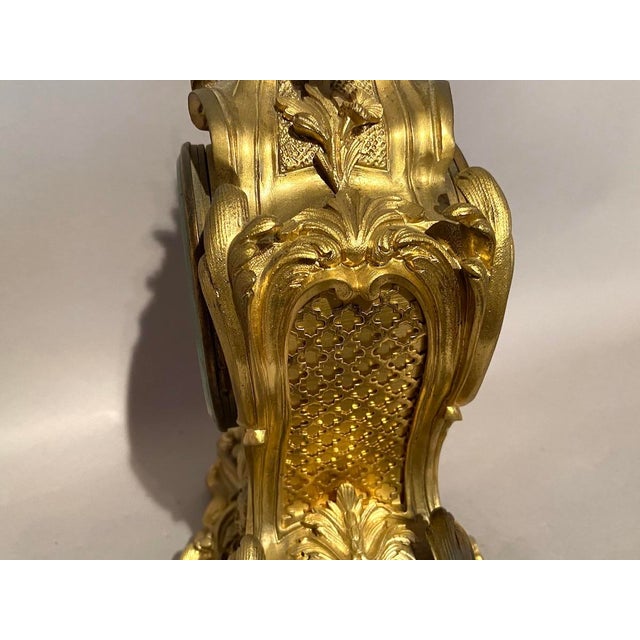 This authentic 19th Century French Louis XV table / mantel clock is an exceptional example of high-quality ormolu bronze...