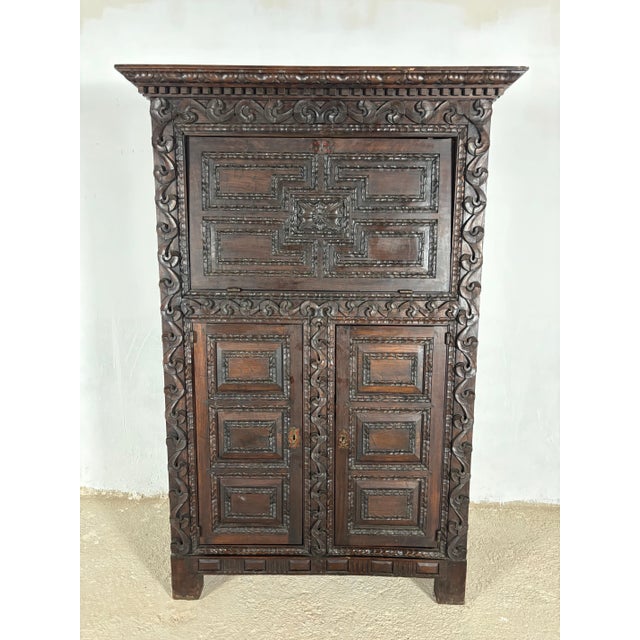 19th Century Baroque Oak Fall-Front Cabinet with Deep Carved Decoration For Sale - Image 14 of 18