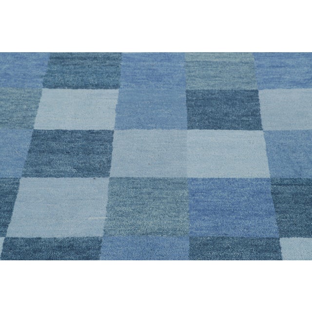Made with hand-knotted wool, this 9x12 rug is an exciting new addition to Rug & Kilim's Scandinavian rug collection—a...