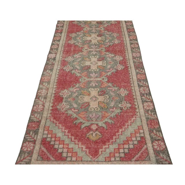 Vintage handknotted runner rug from Konya region of Turkey. Approximately 50-60 years old. In very good condition.
