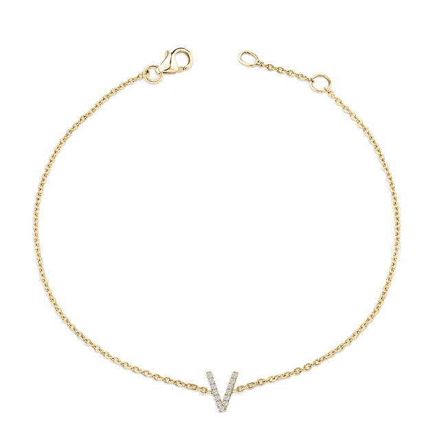 Immerse yourself in the understated elegance of this 10K yellow gold bracelet, for an enrapturing shimmer that captures...