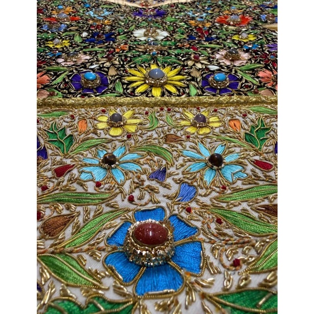 An extraordinary Indian jeweled textile wall hanging showcasing exceptional hand craftsmanship and vibrant floral...