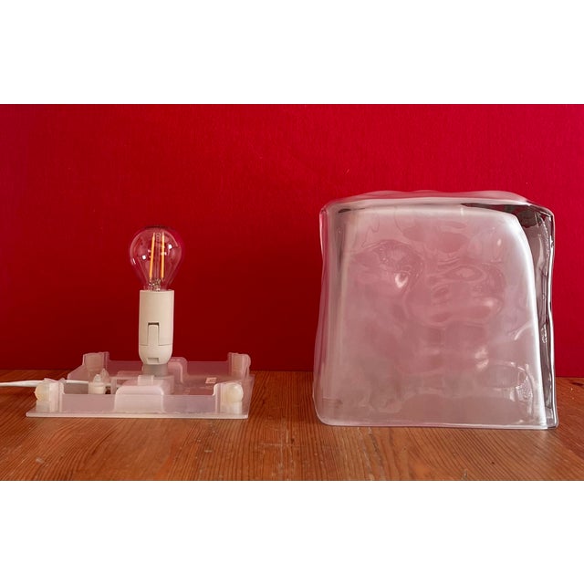 A vintage IKEA 'Iviken' ice cube table lamp. This 1980s lamp is made of thick glass; frosted on the inside and clear on...