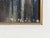 An exceptionally striking mid-20th-century Vietnamese oil painting depicting a canal lined with closely clustered stilt...