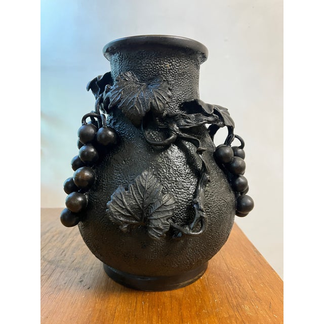 Antique Japanese Bronze Textured Black Metal floral Vase Antique textured metal vase with detailed high relief decoration...