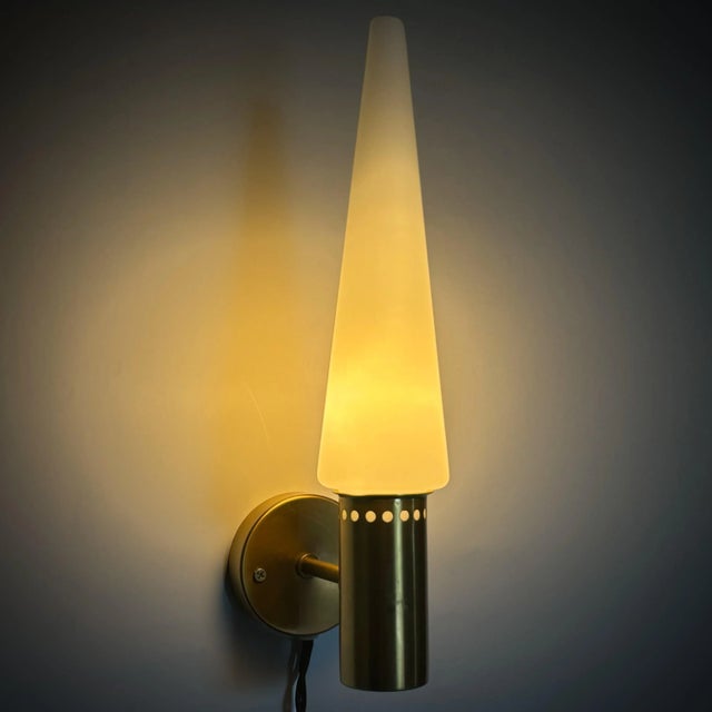 A minimalist wall lamp, model s-1986, designed by hans-agne jakobsson in the 1960s for his company hans-agne jakobsson ab...