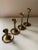 Vintage Brass Candlesticks, Set of 4. Excellent condition with minimal use wear; brass finish remains exceptionally...