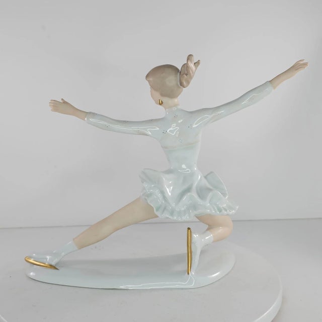 This Vintage Wallendorf Porcelain Figurine captures the elegance of Olympic Ice Figure Skater Sonja Henie. Crafted by...