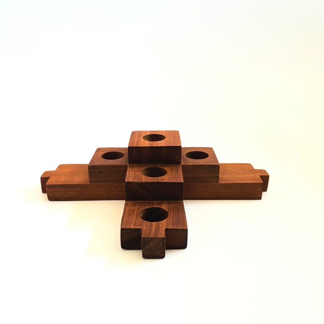 A vintage wood block candle holder for holding tealight or votive candles. Tiered design and a beautiful grain to the...