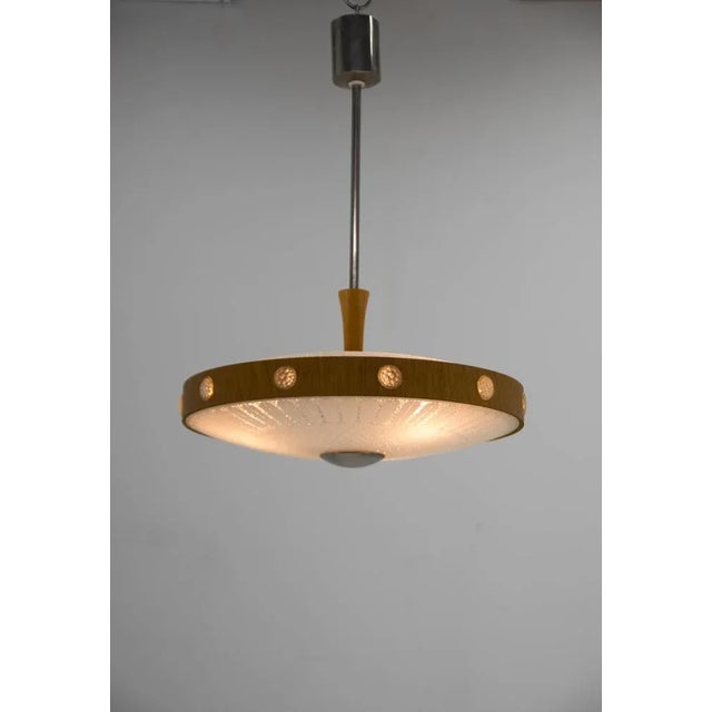 Ufo chandelier made of wood and glass. Made in germany in 2960s very good original condition. 3x40w, e35-e37 bulbs us...