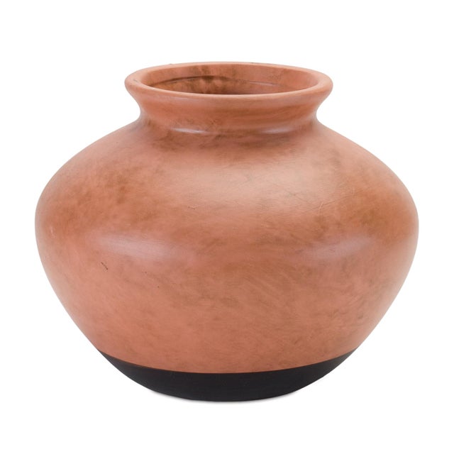Bring timeless style and artisanal charm to your home with this Two-Tone Ceramic Urn Vase. Featuring a graceful silhouette...
