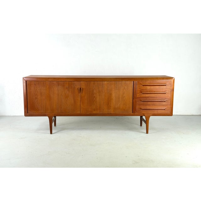 FA32 Sideboard by Ib Kofod Larsen for Faarup, 1960s, in Restored conditions. Designed 1960 to 1969