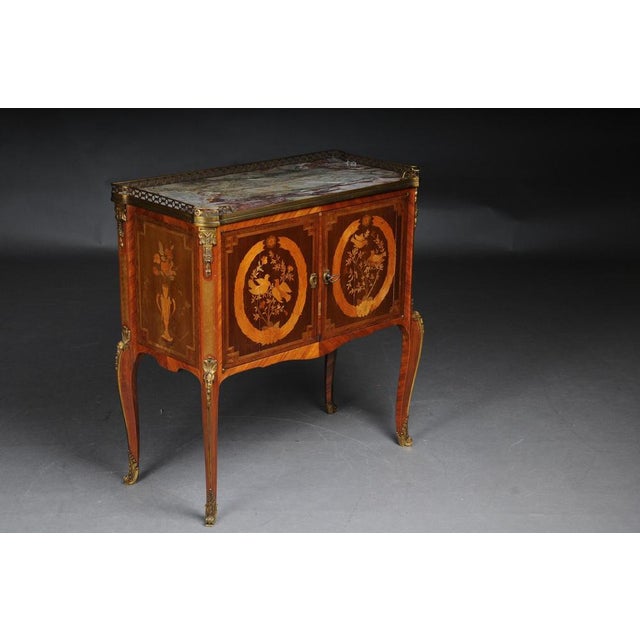 French marquetry dresser Transition, Napoleon III, circa 1870 Marquetry: wood on solid oak body. Marbled and profiled...