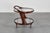 Very stylish bar cart with elegant curved wood profiles and a double circular tray. Attributed to Cesare Lacca, Italian...