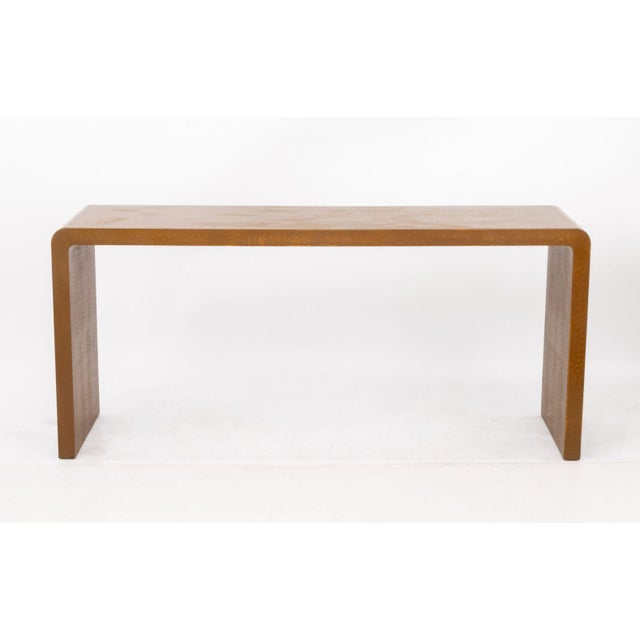 Karl Springer Style Faux Ostrich Tan Leather Wrapped Console Table. 29.5" H x 65" W x 18" D. Provenance: From a New York...