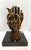 Signed Arthur Marshak, "With These Hands", Bronze Sculpture, resting on a polished stone base.