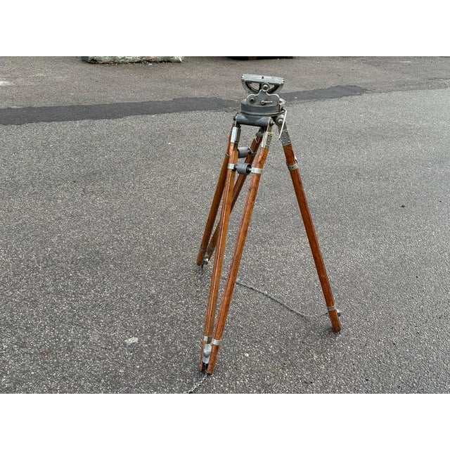 1920´s Adjustable Studio Camera Tripod Stand. Wood and iron camera stand, features a fully adjustable platform top that...