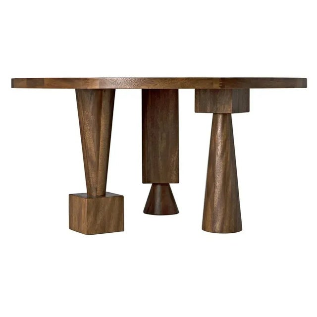 Geometric design meets mid-century free form shape. The Hybrid Dining Table is positively Picassoesque. Walnut and Veneer...