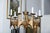 This Medieval touch, brutalist hammered mid-century modern 7-arms chandelier, was made by Moe Bridges circa 1970s. The...