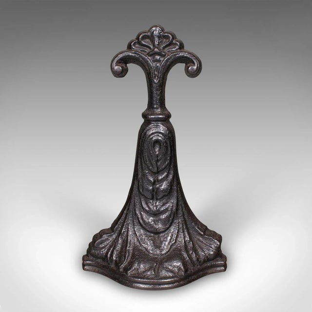 This is an antique door porter. An English, cast iron doorstop, dating to the Victorian period, circa 1860. A fine...