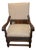 Antique Carved Wood Arm / Throne Chair Straw / Hair Stuffed W/ Metal Rivets For Sale