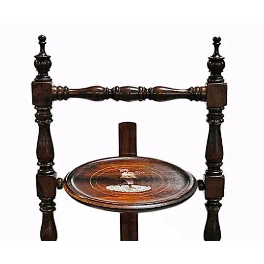 Antique English Victorian-era etagere, barley twist cake or tea stand featuring three circular inlaid shelves.