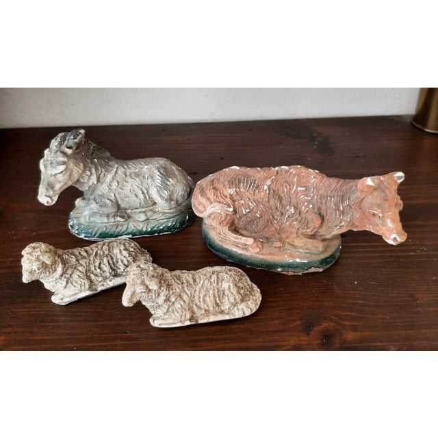 Charming 10-piece Italian Nativity set includes Baby Jesus, Mary, Joseph, three Wise Men, a cow, a donkey, and two sheep....