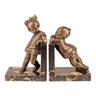 Early 20th Century Pair of Art Déco Bronze Bookends With Marble Base Designed by Alexandre Kéléty for Etling Paris For Sale