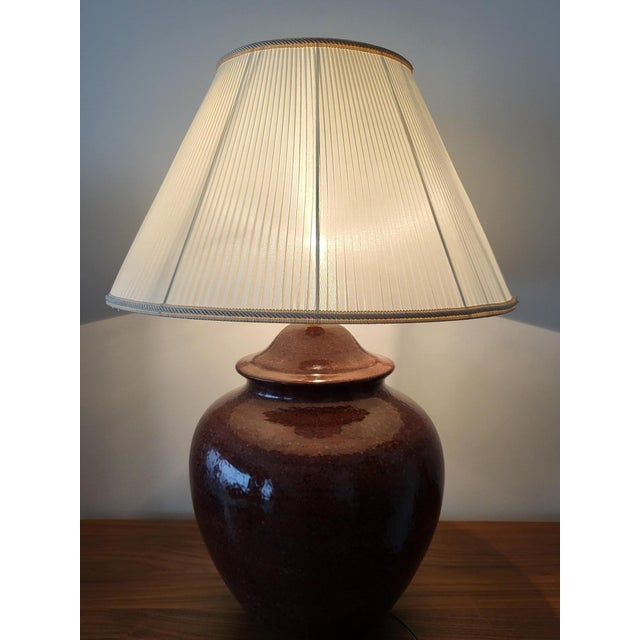 Large lamp designed by Hubert Olivier, crafted from ceramic using Provençal ochre pigments, ranging from Bordeaux to wine...