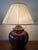 Large lamp designed by Hubert Olivier, crafted from ceramic using Provençal ochre pigments, ranging from Bordeaux to wine...