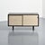 A design classic by Florence Knoll, this sideboard features two raffia-covered doors for an elegant touch. The rectangular...