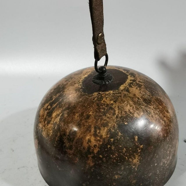 Featuring a heavily distressed and weathered finish, the dome-shaped bell displays a beautiful mix of dark metal, oxidized...