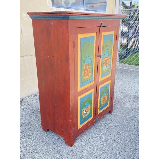 Country Farmhouse Red & Blue Forest Carved Wardrobe TV Entertainment Cabinet. Item features heavy solid wood construction,...
