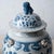 Chinese Pair of Chinese Blue and White Glazed Jars With Foo Dog Finials For Sale - Image 3 of 10