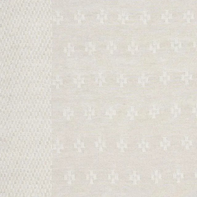 Inspired by a couture scarf and handwoven on an antique shuttle loom, this linen sheer features an exquisite double border...