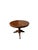 An elegant round walnut table dating back to the 19th century, characterized by harmonious lines and balanced proportions....