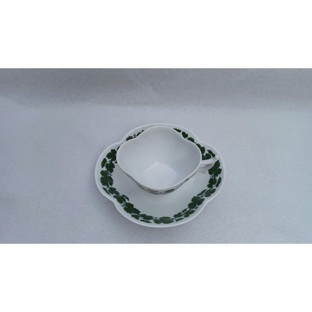 An exquisite and rare porcelain mocca duo (cup and saucer) manufactured by the prestigious Meissen Porcelain Manufacture...